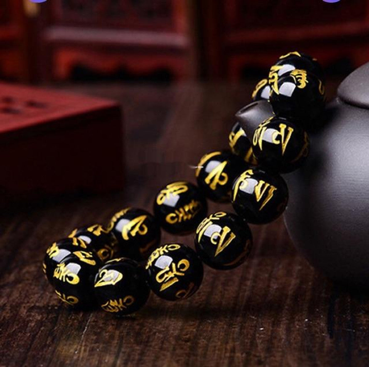 กำไลหินออบซิเดียนสลักคาถา